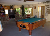 Play a game of pool in the Balsam Beach Resort lodge on Lake Plantagenet.